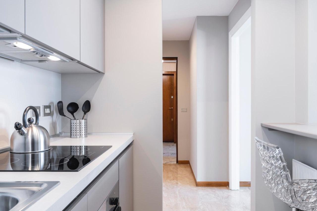 Contempora Apartments - Elvezia 8 - E33 มิลาน ภายนอก รูปภาพ